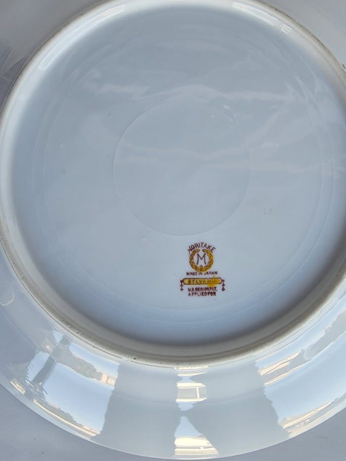4 Noritake china side pates