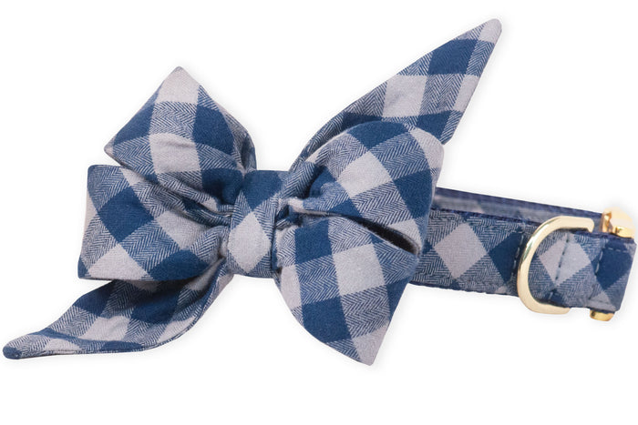 Dress your pup to impress with this adorable blue checkered belle bow collar, combining cozy fabric, gleaming hardware, and serious tail-wagging style. Ideal for photo ops, park playdates, or just turning heads.