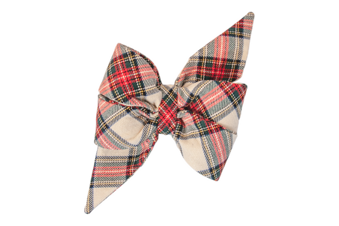 Make your pup the talk of the dog park with this feminine, red,  plaid belle bow, featuring festive tones in a classic tartan pattern—perfect for holiday charm or year-round flair.