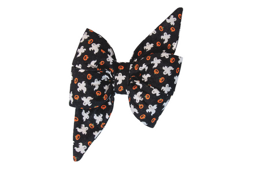 Halloween feminine dog belle bow with a black base decorated in cute ghost figures and tiny pumpkins. The extra-large size and sharp, pointed belle bow shape make it a standout accessory for pets celebrating Halloween in style.