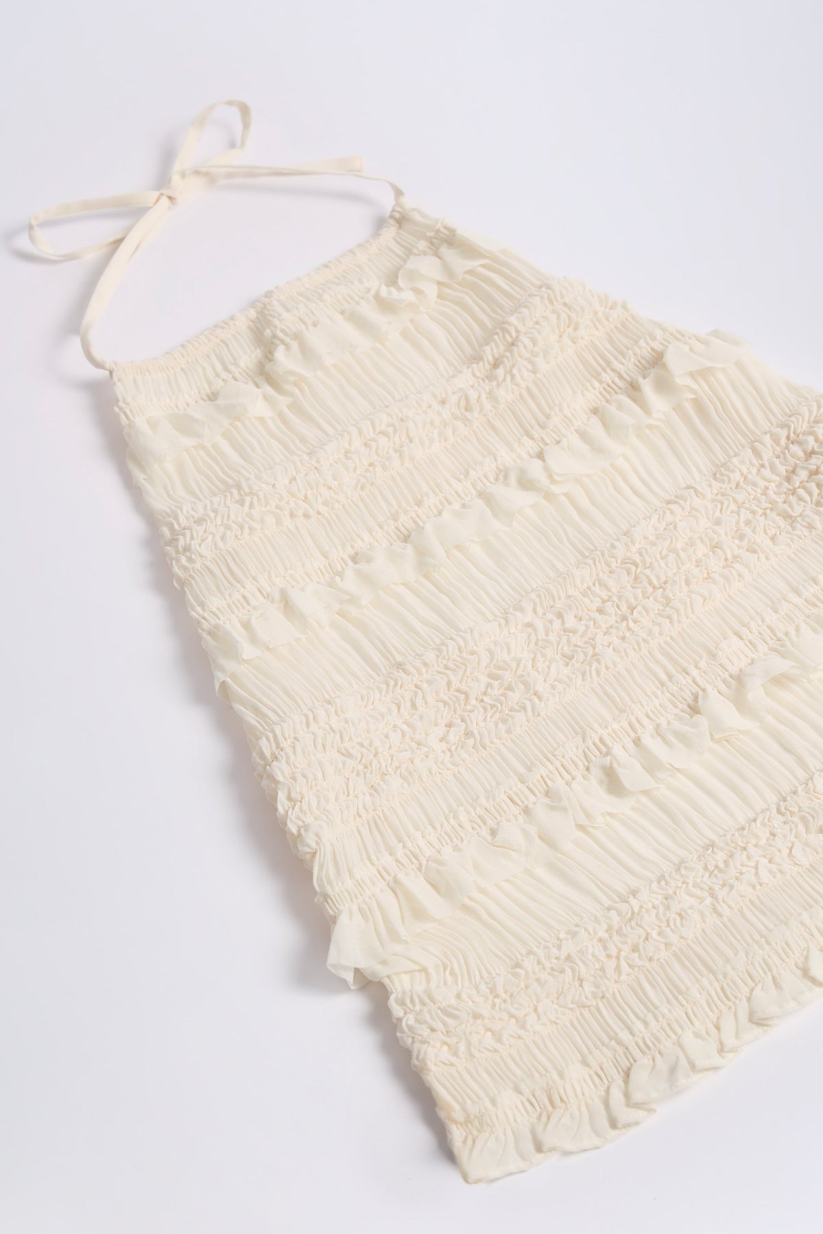 Ruffled High-Neck Backless Top in Ivory