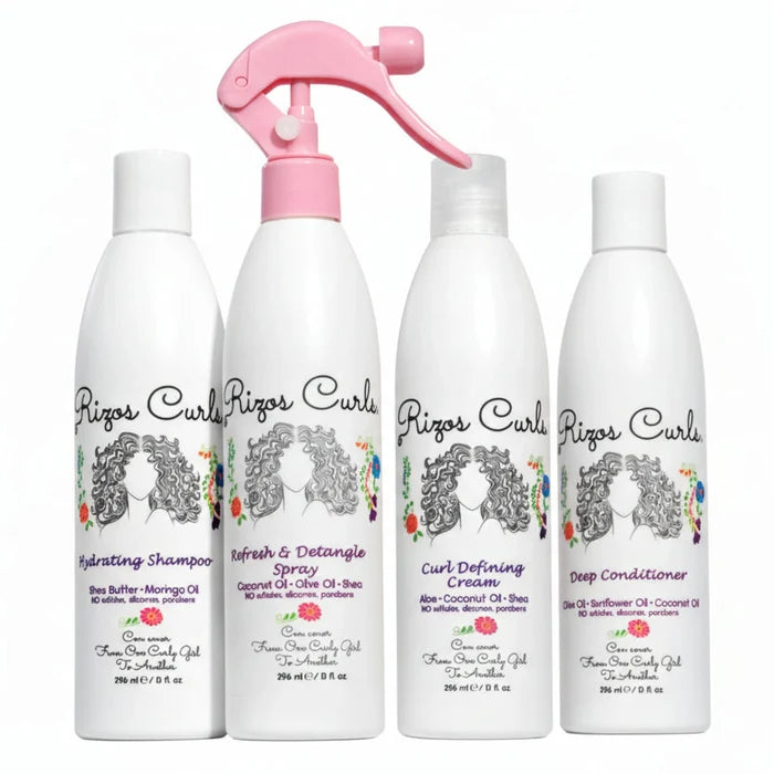 Set of Rizos Curls hair care products on a pink background with aloe vera leaves.